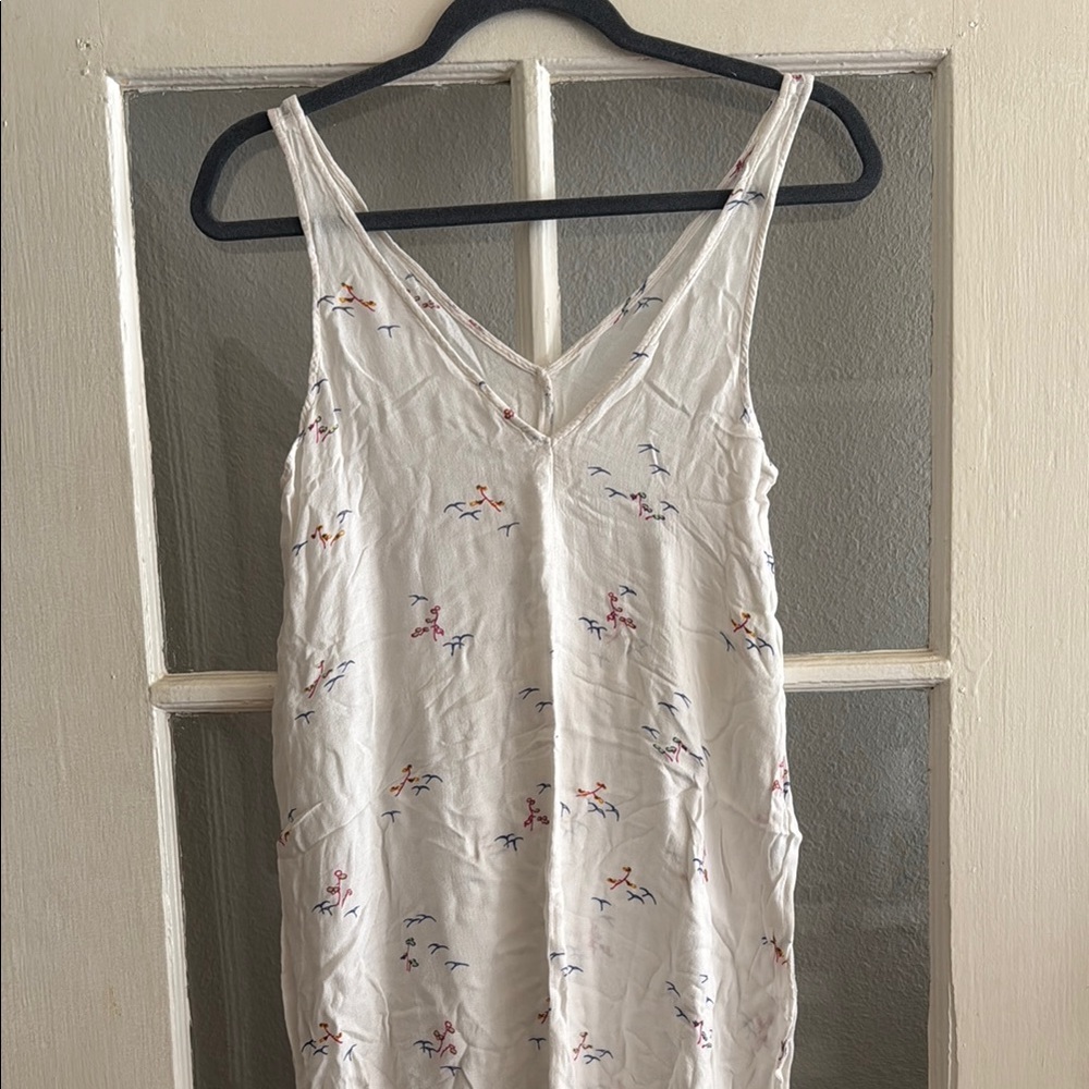 White Sleeveless Dress with Colorful Bird Print